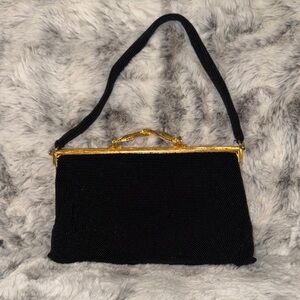 Elegant Black and Gold Women's Handbag